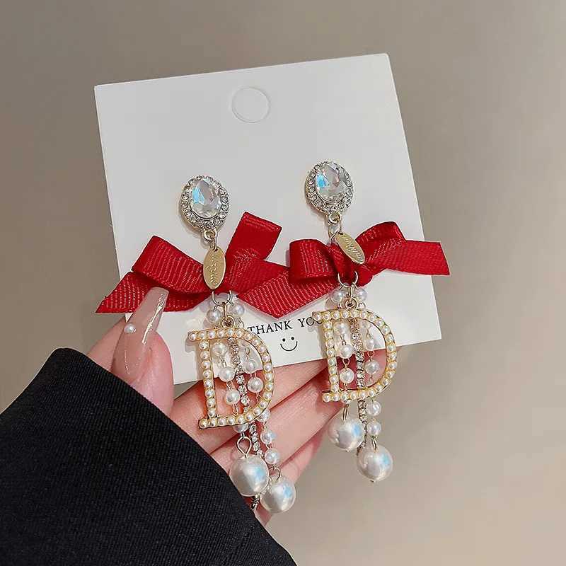 Celebrity tassel pearl earrings High class temperament earrings Long personty bow exaggerated earrings Sp Girl Y251210