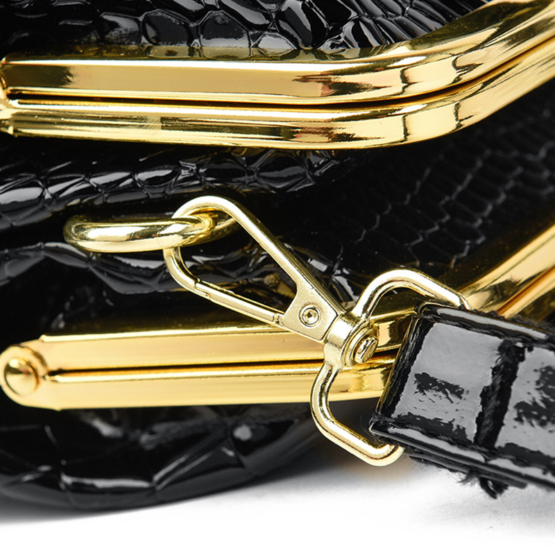 Manufacturer's spot wholesale women's handbags, fashionable diagonal cross clip mouth bags, European and American Spanish women's bags,