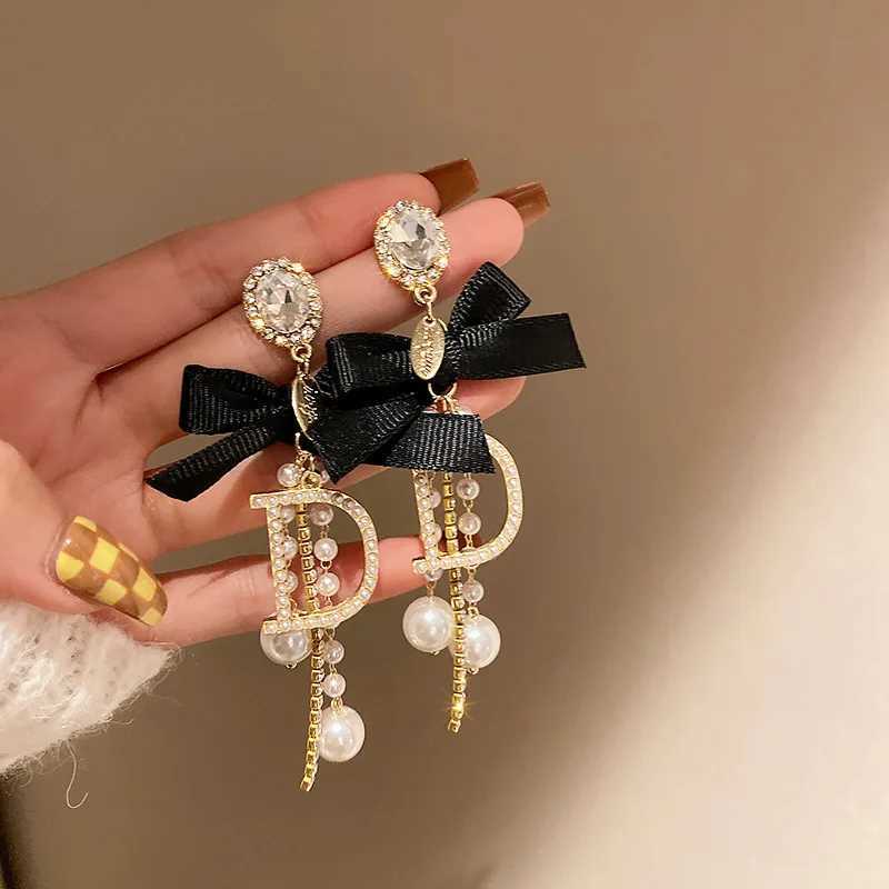 Celebrity tassel pearl earrings High class temperament earrings Long personty bow exaggerated earrings Sp Girl Y251210