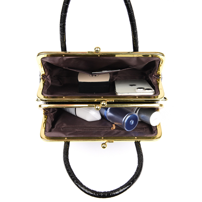 Manufacturer's spot wholesale women's handbags, fashionable diagonal cross clip mouth bags, European and American Spanish women's bags,