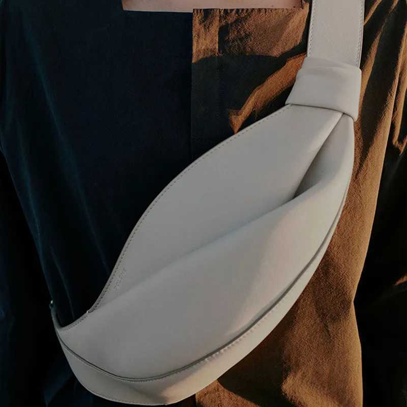 2025 New Fiable Horn Bag large capacity low shaped persali niche travel smooth cowhide crossbody bag Y251211