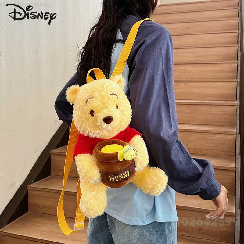 Disney Winnie The Pooh Backpack for Women 2025 New Fashion Cartoon Travel Outdoor Small Backpack Cute Versatile Girls Phone Bag H251212