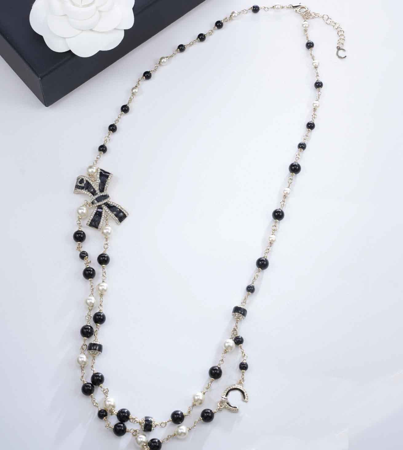 2026 Luxury quality charm long chain pendant necklace with black color design and knot shape in 18k gold plated have stamp PS6167B