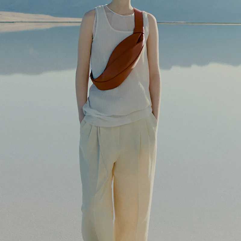 2025 New Fiable Horn Bag large capacity low shaped persali niche travel smooth cowhide crossbody bag Y251211