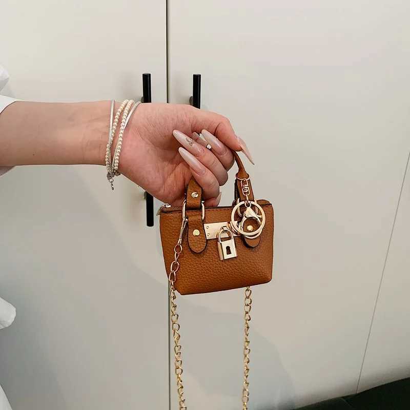 Girls slung hand-held small square bag 2025 summer new classic children carrying e-shoder messenger bag wallet keychain Y251213