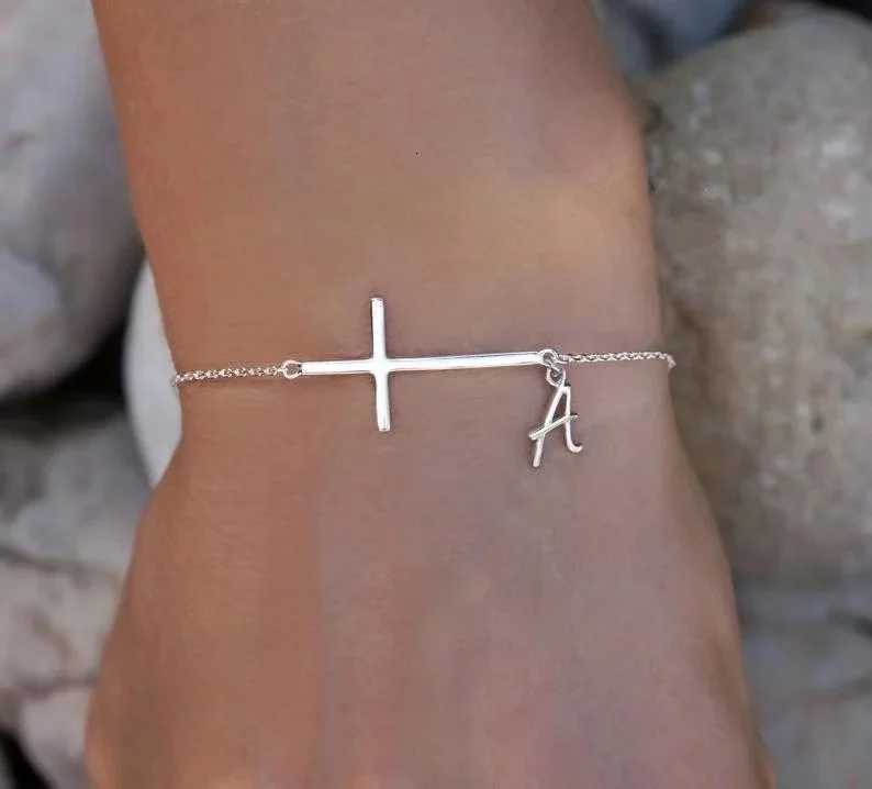 Sideways Cross with Dainty Initial - Initial In Silver Plated M251213