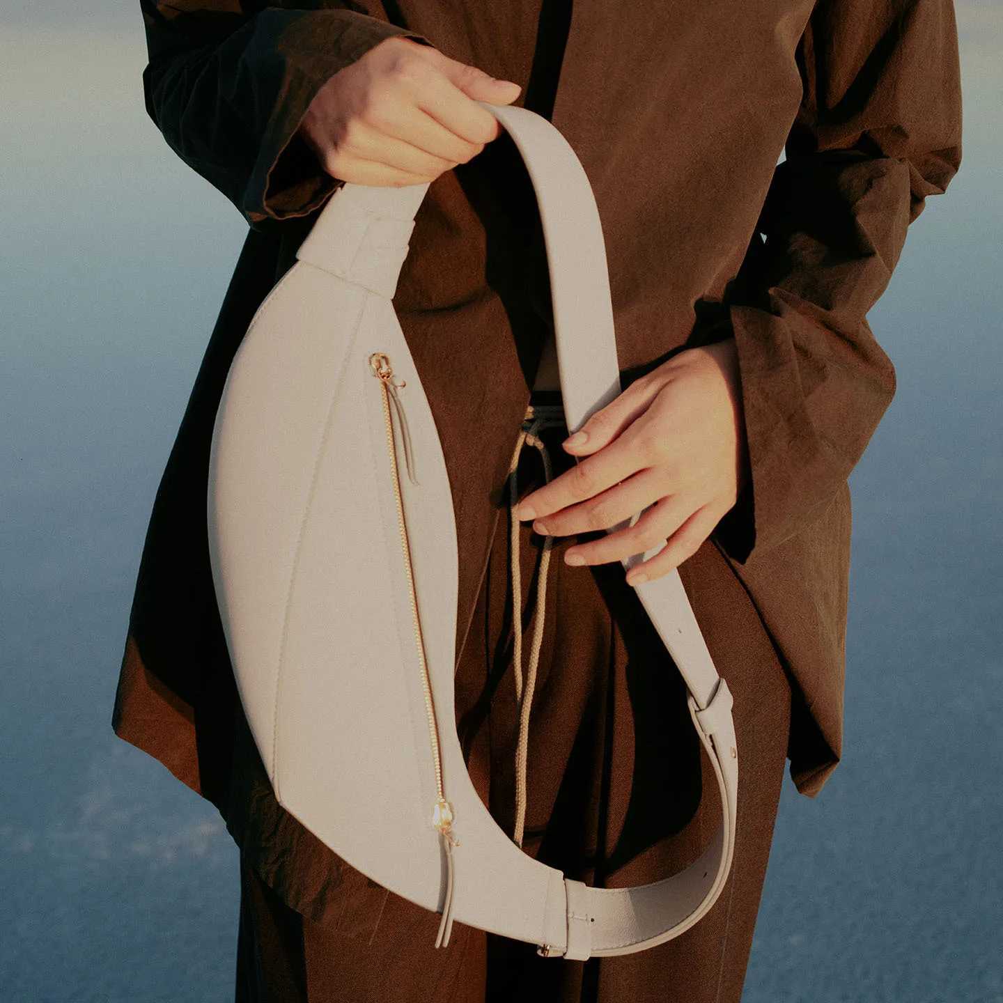 2025 light luxury new smooth cowhide womens shoulder crossbody bag fashionable and versatile cow horn bagT251213