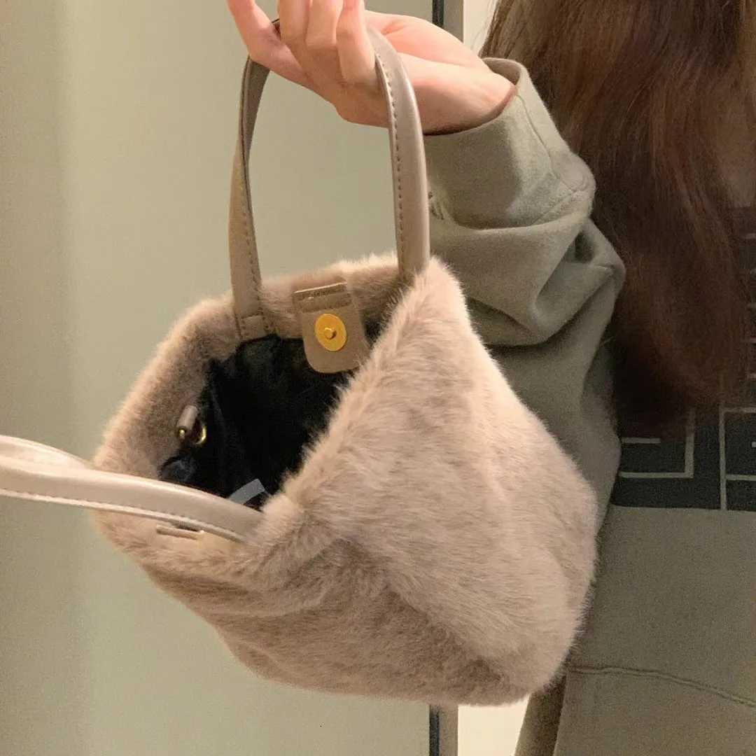 2025 new khaki plush bag hand-held bucket bag womens Korean style commuting small bag fashionable and versatile fur shoulder baT251213