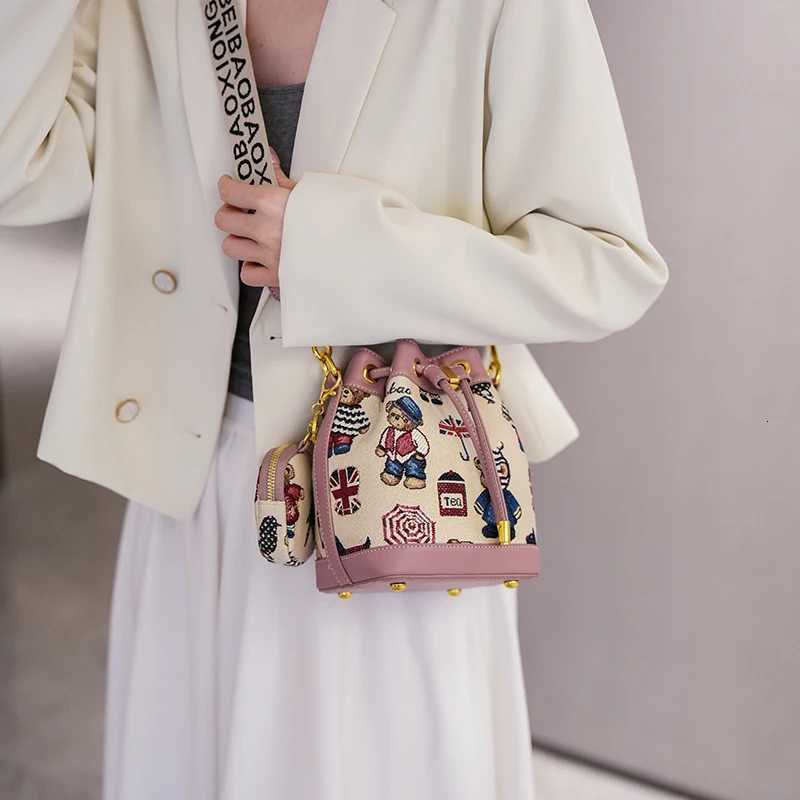 Fashion womens Shoulder bag Bucket Bag for Women 2025 Womens Cartoon Bear Light Luxury Versatile Crossbody Womens Bag PurseT251213