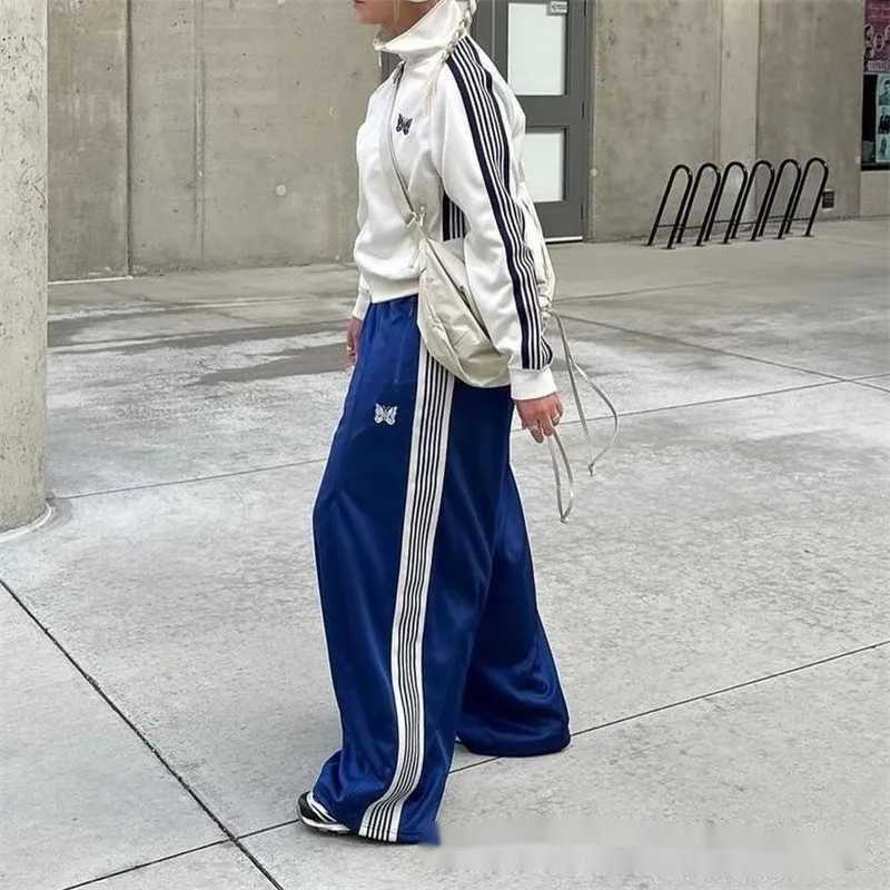 2025 top quality needles trk pants butterfly embroidered wide leg pants loose sports pants for men and women. J250630