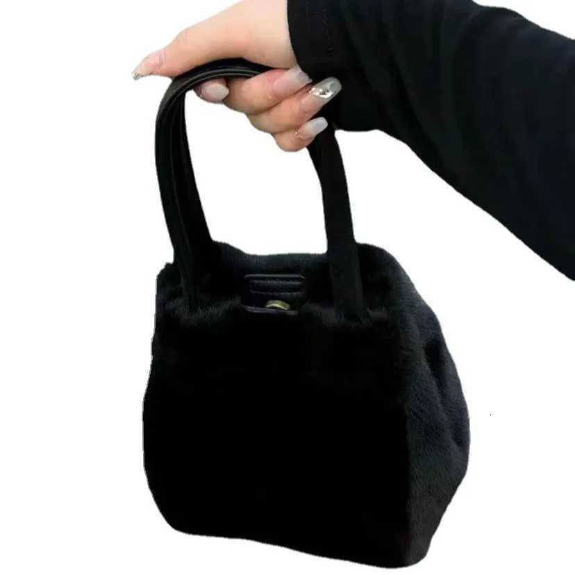 2025 new khaki plush bag hand-held bucket bag womens Korean style commuting small bag fashionable and versatile fur shoulder baT251213