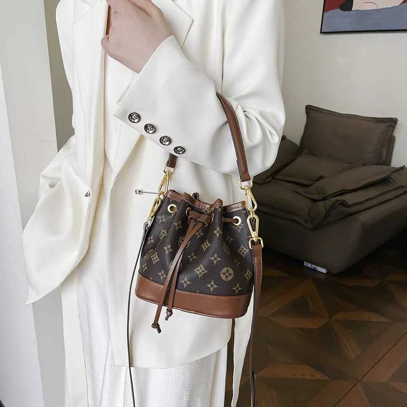 2026 Lady Luxurious Retro Bucket Bag-Shoulder Sling Bag Backpack Handbag Print Drawstring Shoulder bag Casual VersatileT251213