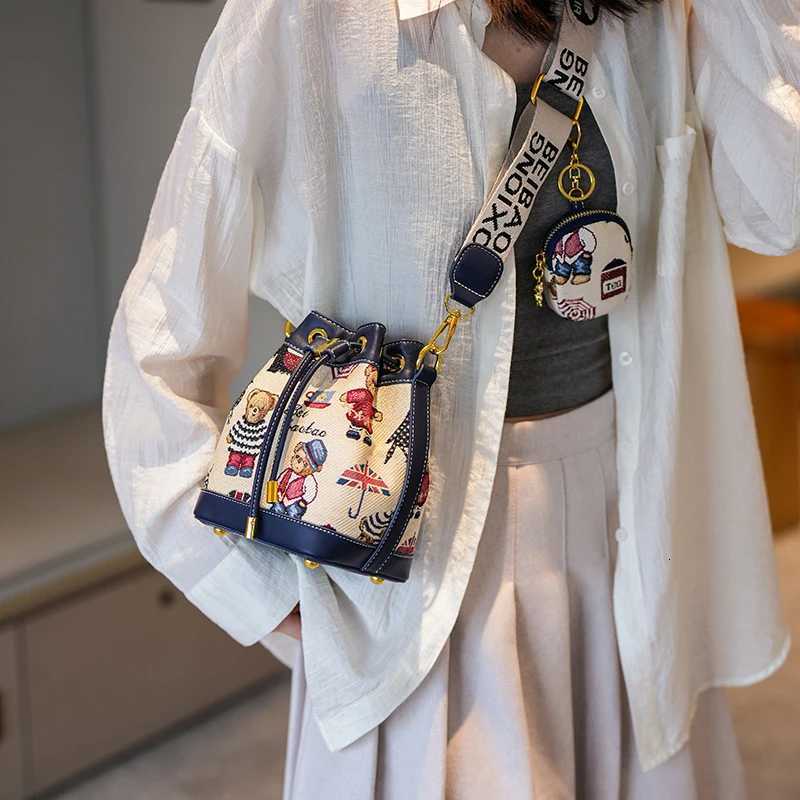 Fashion womens Shoulder bag Bucket Bag for Women 2025 Womens Cartoon Bear Light Luxury Versatile Crossbody Womens Bag PurseT251213