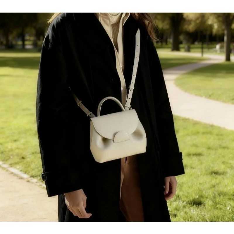 2025 new texture simple bag female niche smiley face bag fashionable and casual versatile handbag single shoulder crossbody bT251213