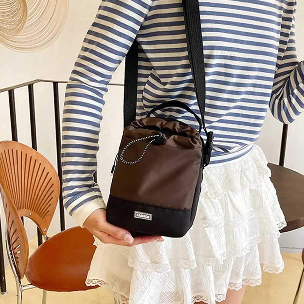 Nylon Sling Bag Water bottle bag Waterproof Outdoor Travel Pouch New Canvas Casual Crossbody Bag Fashion Bag Shoulder BagsT251213