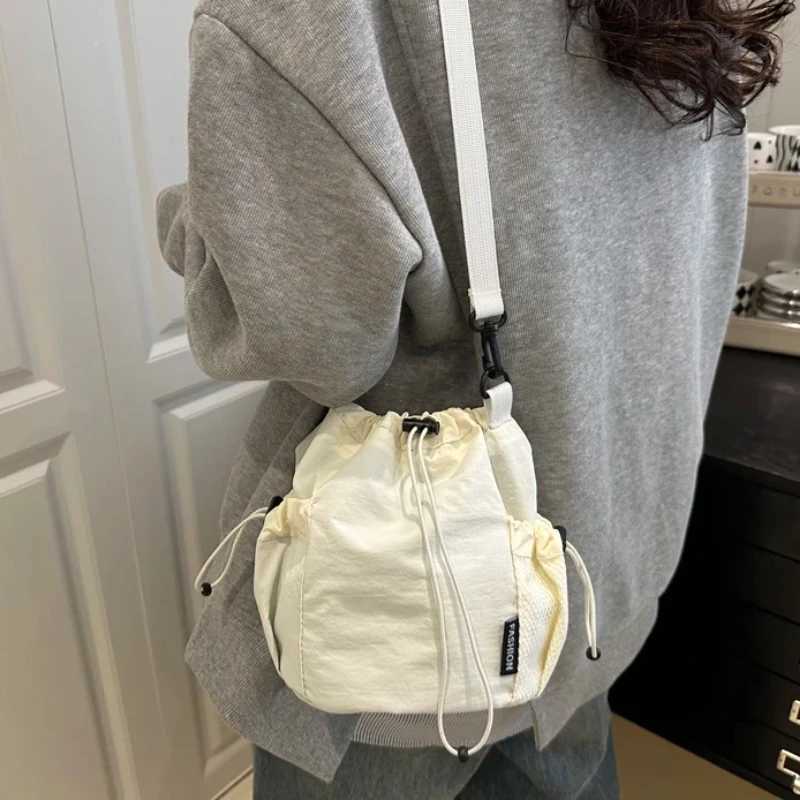 Lightweight Nylon Bucket Bag Womens Crossbody Bags Ins Drawstring Mobile Phone Bag Korean Single Shoulder Bag Casual HandbagT251213