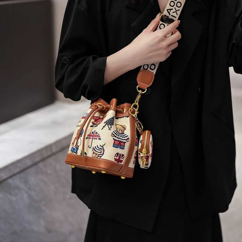 Fashion womens Shoulder bag Bucket Bag for Women 2025 Womens Cartoon Bear Light Luxury Versatile Crossbody Womens Bag PurseT251213