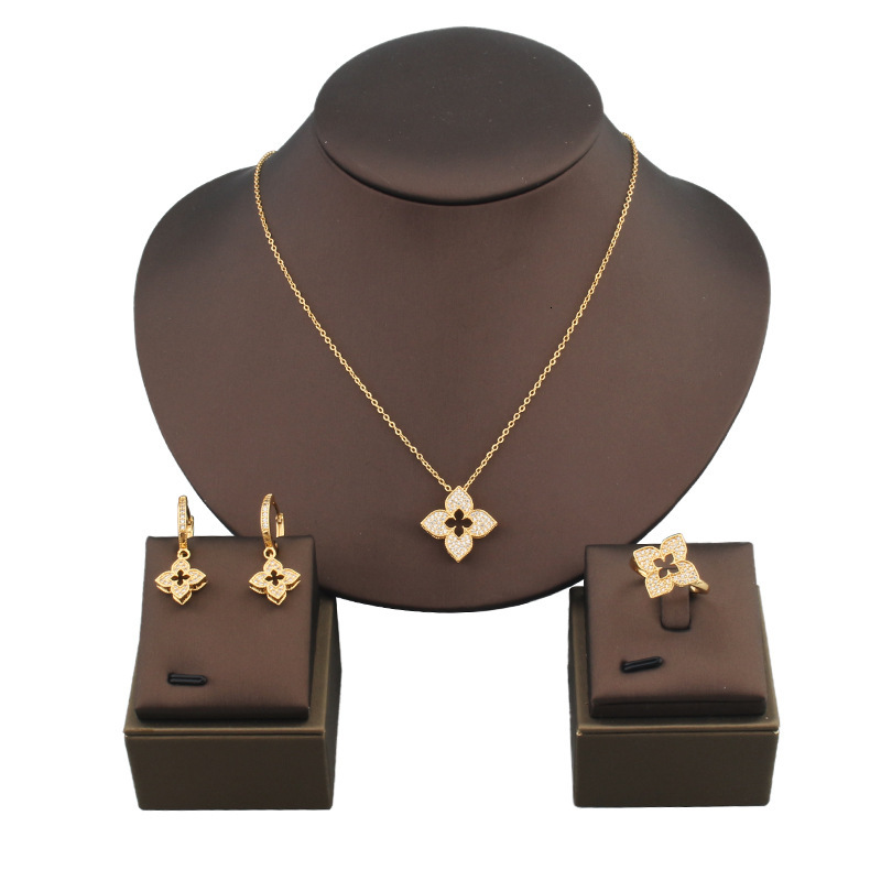 Minimalist Fresh Hollow Full Diamond Lucky Clover Necklace Jewelry Three-Piece Set Gold-Plated Earrings Ring 33 1B