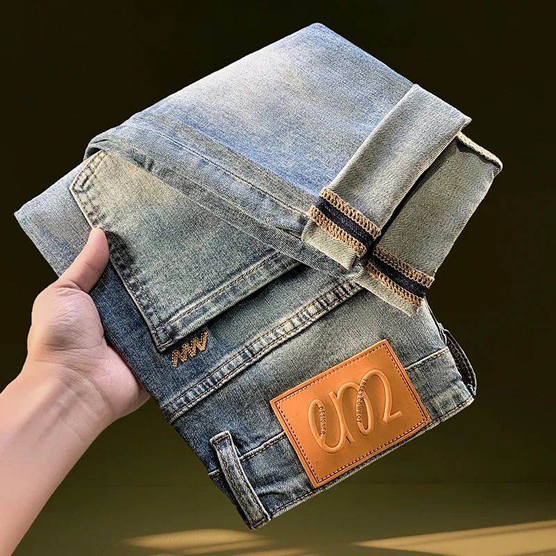 Nine point ripped denim jeans for men in the summer of 2025 thin and trendy retro washed n leg elastic pants 251205