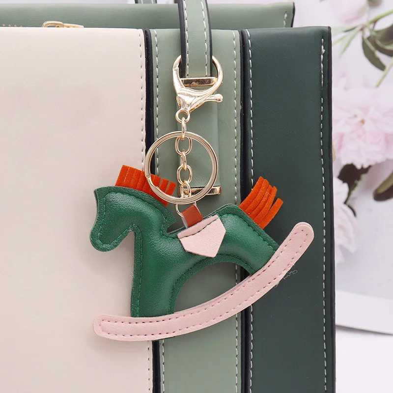 Trendy Colorful Carousel Car Bag Pendant Keyring simple PU Leather Rocking Horse Charm Keychain New Jewelry for Womens M251215