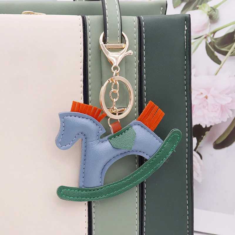 Trendy Colorful Carousel Car Bag Pendant Keyring simple PU Leather Rocking Horse Charm Keychain New Jewelry for Womens M251215