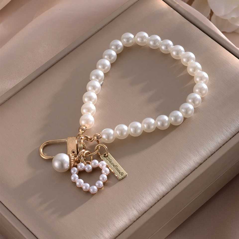 UILZ 2PCS Cute Shell Heart Bow Imitation Pearl Beads Chain Pendant Phone Keychain Imitation Pearl Bag Key Chain M251215