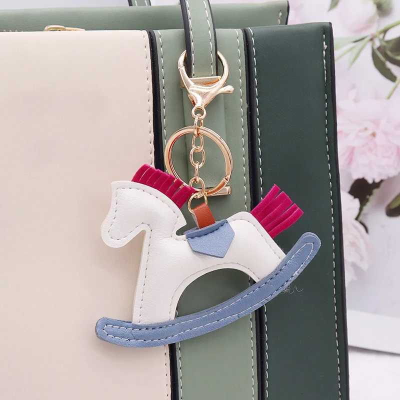 Trendy Colorful Carousel Car Bag Pendant Keyring simple PU Leather Rocking Horse Charm Keychain New Jewelry for Womens M251215