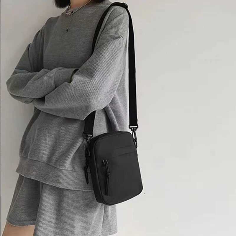 Neutral style shoulder bag for men and women small square bag suitable for travel and photography pure black bagT251215
