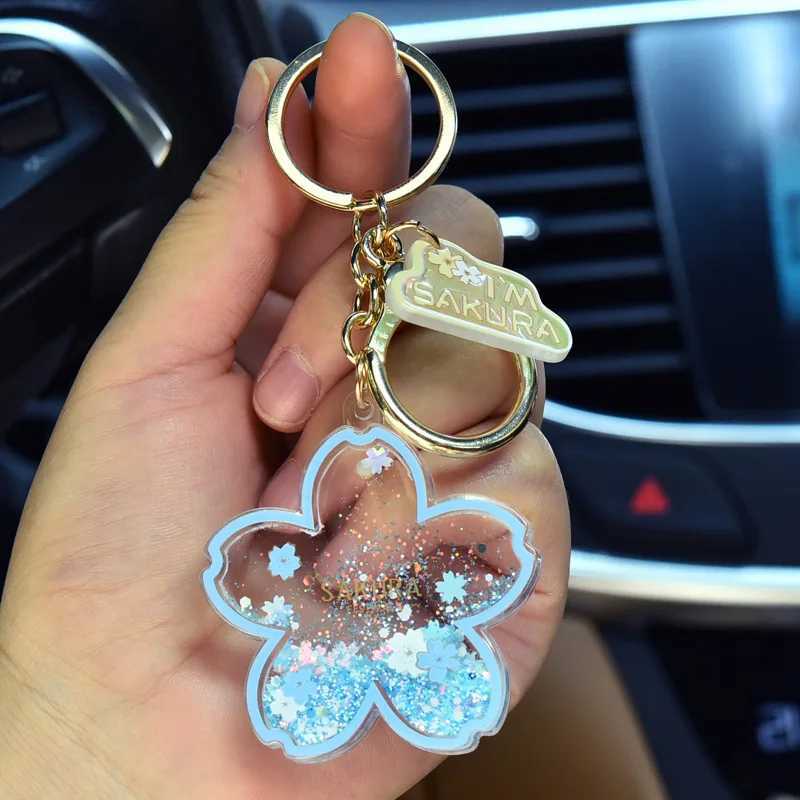 Creative Acrylic Quicksand Into Oil Cherry Blossom Key Chain Cute Couple Bag Pendant Keyfob Floating Liquid Sakura Keychain Gift M251215