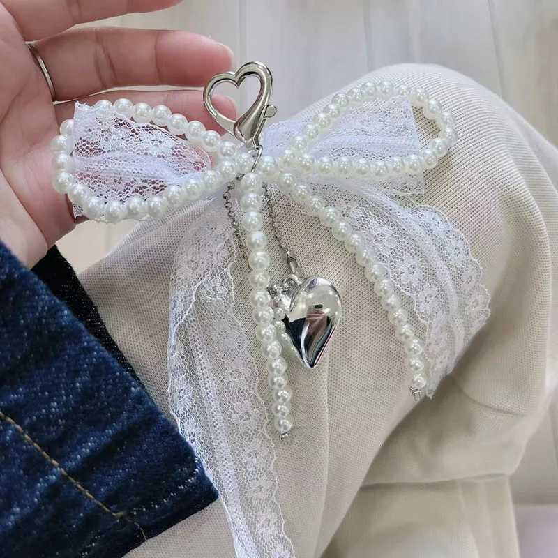 2025 New Korean Sweet Pearl Bow Keychain Heart Pendant Keyring Y2K Aesthetic Key Holder for s Bag Pendant Accessories M251215