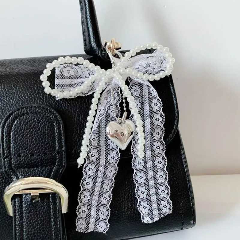 2025 New Korean Sweet Pearl Bow Keychain Heart Pendant Keyring Y2K Aesthetic Key Holder for s Bag Pendant Accessories M251215