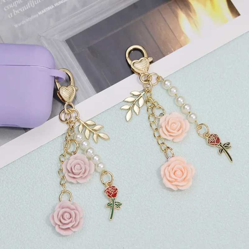 Rose Camellia Bag hanging Car Keychain Women Sweet Pearl Tassel Flower Metal Leaf Bag Decoration Car Interior Accessories M251215