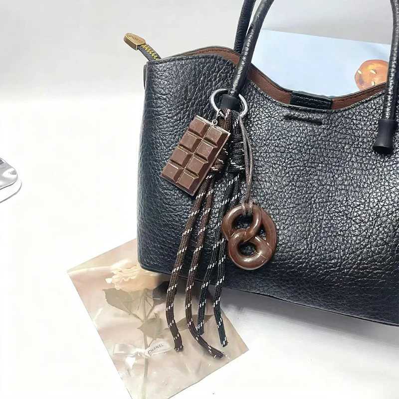 Creative Style Bread Car Keychain Bag Maillard Leather Dog Chocolate Pendant Hand Woven Bag Hanging Charm Accessories M251215
