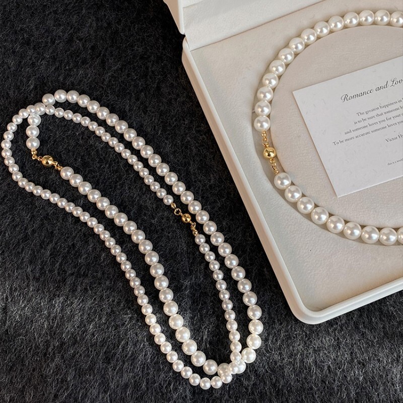 Designer Necklace Luxury Jewelry Star Same Round Bead Magnetic Buckle Sega Pearl Necklace Women's Sweater Chain Elegant Niche Necklace Fashionabl