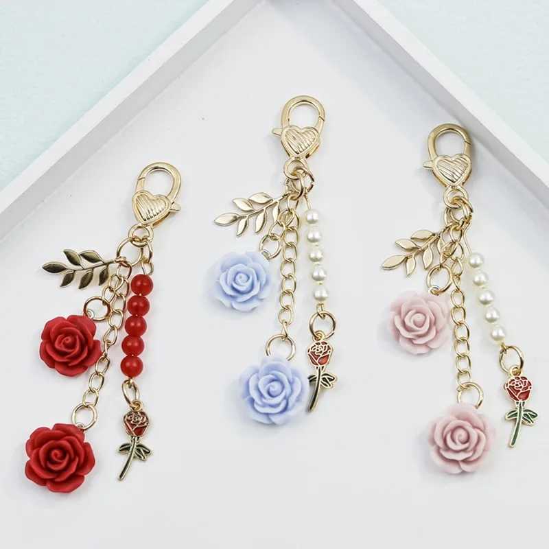 Rose Camellia Bag hanging Car Keychain Women Sweet Pearl Tassel Flower Metal Leaf Bag Decoration Car Interior Accessories M251215