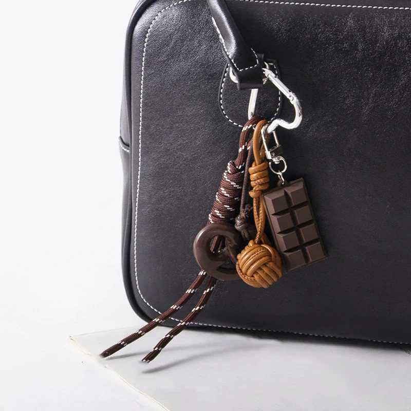 Creative Style Bread Car Keychain Bag Maillard Leather Dog Chocolate Pendant Hand Woven Bag Hanging Charm Accessories M251215