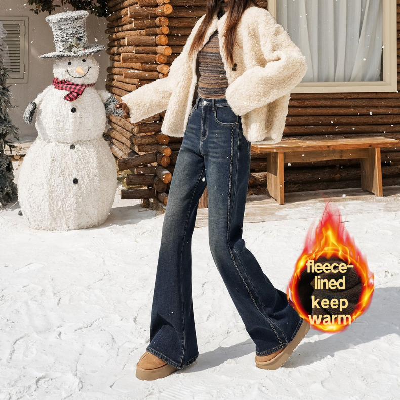 Fleece, warm, elastic, embroidered, slightly flared jeans for women are loose and do not stick to the legs. Retro flared pants are slimming and versat