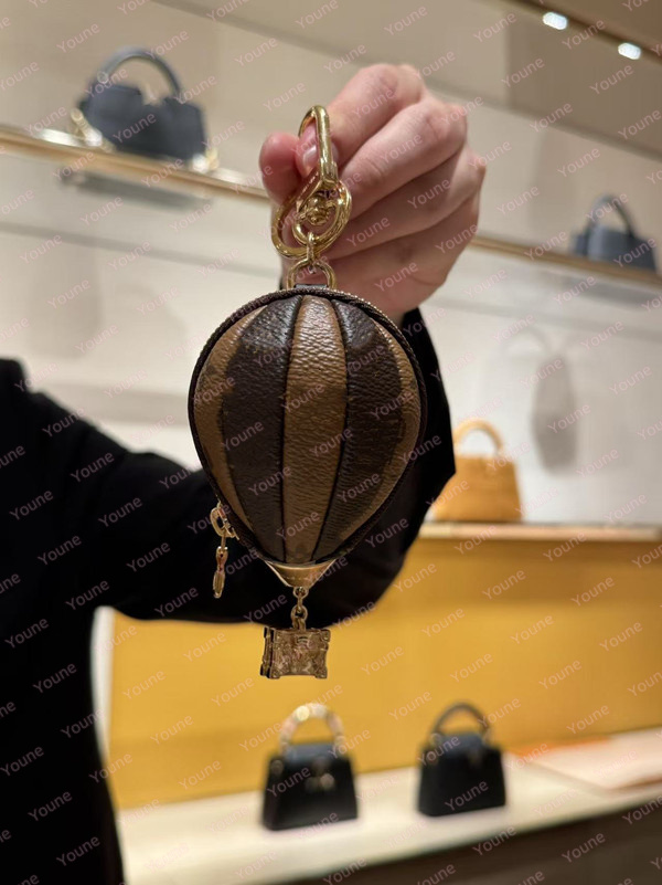 Designer wallet Hot Air Balloon Bag Charm Designer Metal Keychain bags Monogram Flower iconic key holder bag Fire balloon decoration bag pendant Keychains gift