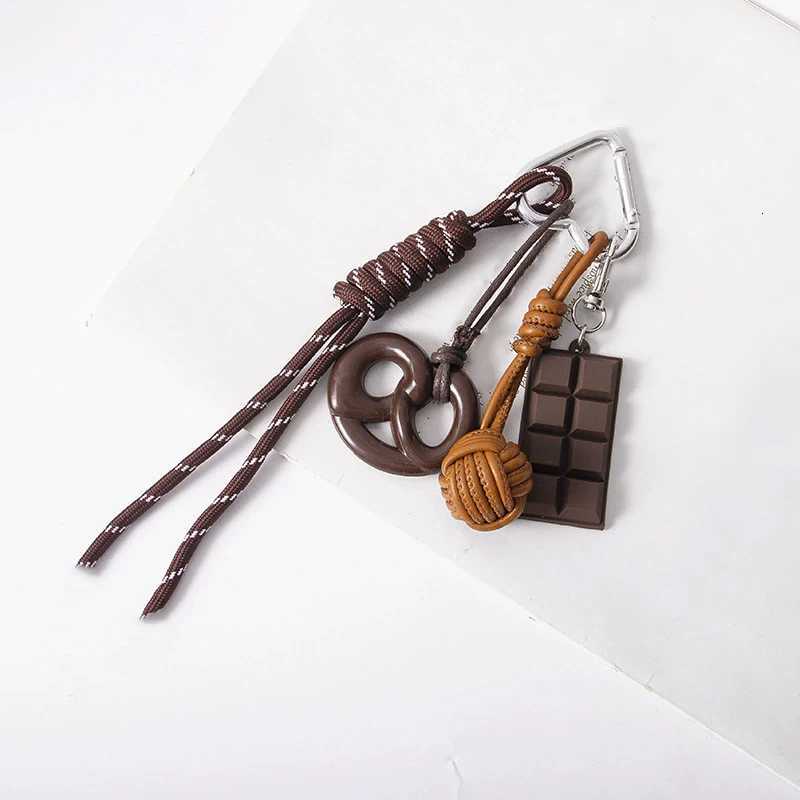 Creative Style Bread Car Keychain Bag Maillard Leather Dog Chocolate Pendant Hand Woven Bag Hanging Charm Accessories M251215