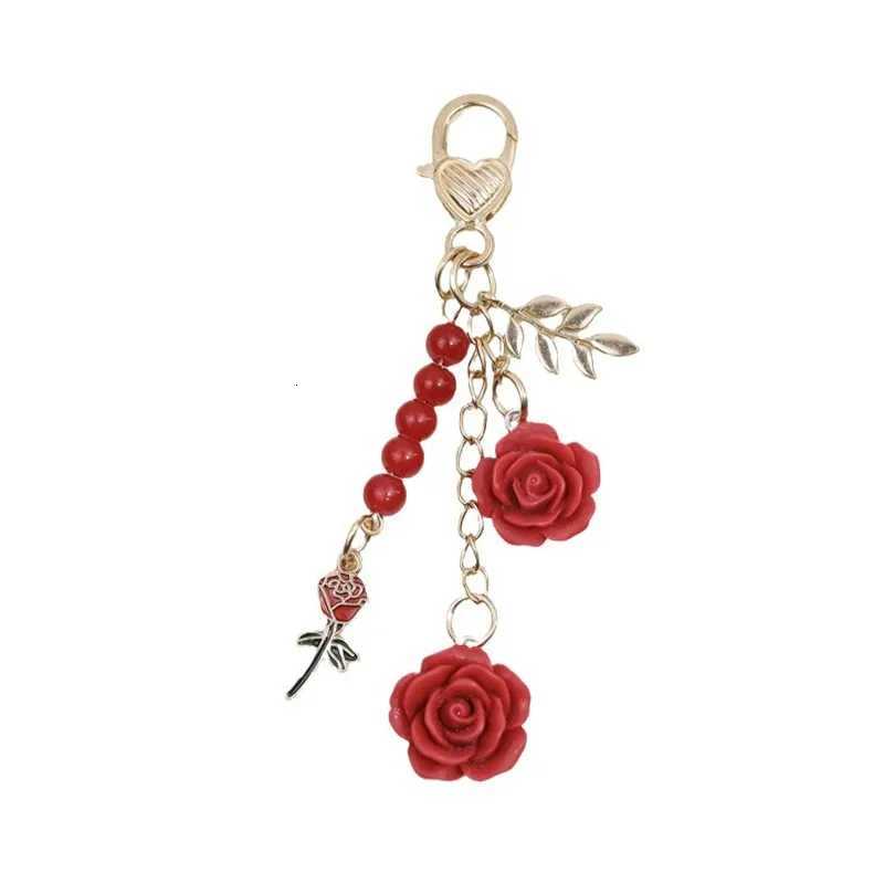 Rose Camellia Bag hanging Car Keychain Women Sweet Pearl Tassel Flower Metal Leaf Bag Decoration Car Interior Accessories M251215