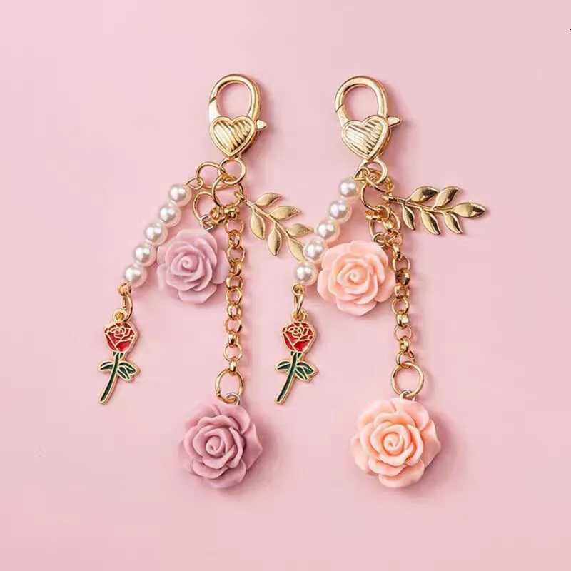 Rose Camellia Bag hanging Car Keychain Women Sweet Pearl Tassel Flower Metal Leaf Bag Decoration Car Interior Accessories M251215