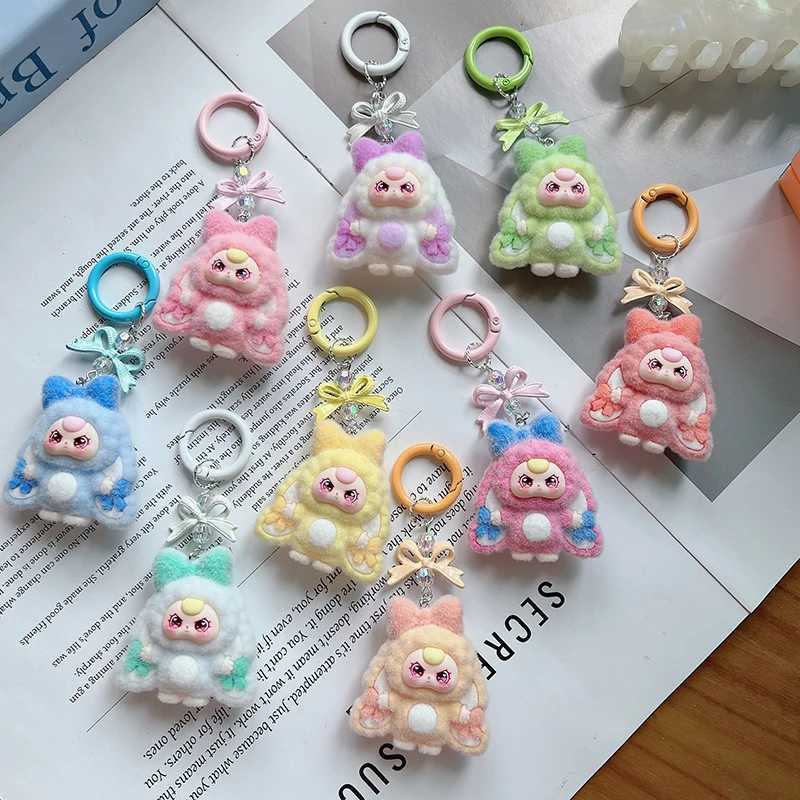 Mini Three Flocking Keychain Trendy Blind Box Figures Key Chain Kawaii Dora Wendy Doll Keyring Bag Charms Christmas Gifts M251215