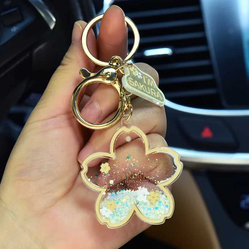 Creative Acrylic Quicksand Into Oil Cherry Blossom Key Chain Cute Couple Bag Pendant Keyfob Floating Liquid Sakura Keychain Gift M251215