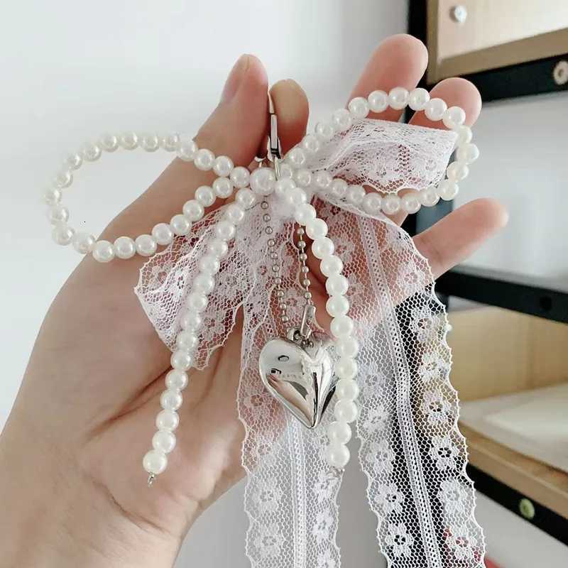 2025 New Korean Sweet Pearl Bow Keychain Heart Pendant Keyring Y2K Aesthetic Key Holder for s Bag Pendant Accessories M251215