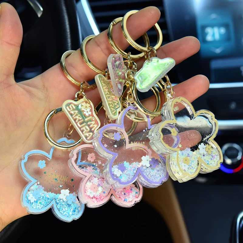 Creative Acrylic Quicksand Into Oil Cherry Blossom Key Chain Cute Couple Bag Pendant Keyfob Floating Liquid Sakura Keychain Gift M251215