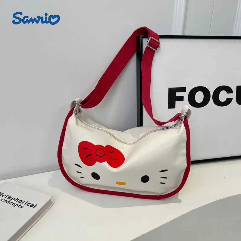 Sanrio MINISO Cartoon Letter Printed Canvas Bag Womens Crossbody Bag New Cute Dumpling Bag Commuter Hello Kitty Shoulder Bag H251216