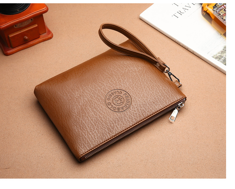 Free shipping wallet niche designer brand men's new casual men's handbag PU soft leather men's bag mobile phone bag large capacity wall