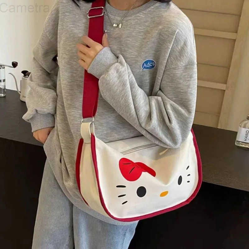 Sanrio MINISO Cartoon Letter Printed Canvas Bag Womens Crossbody Bag New Cute Dumpling Bag Commuter Hello Kitty Shoulder Bag H251216
