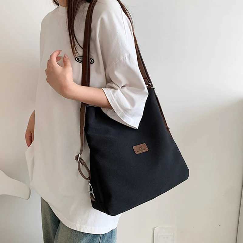 Canvas Tote Bag Womens High Capacity and Minimalist College Style Backpack Fashion Versatile Casual Shoulder Crossbody Bag M251216