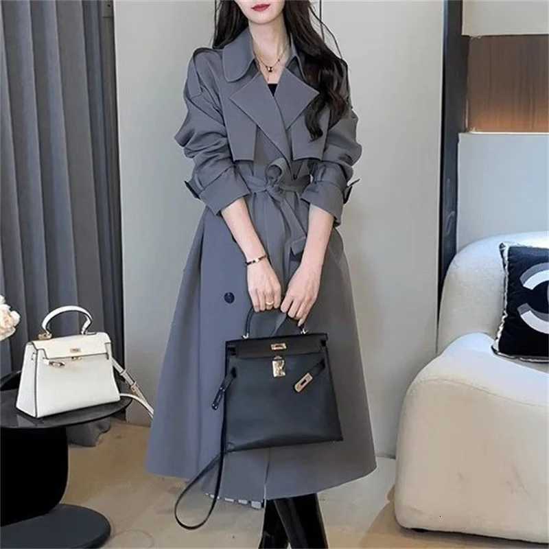 High end Trench Coat Womens 2025 Spring Autumn mid to long Fashion Temperament slimming double breasted Windbreaker SolidT251216